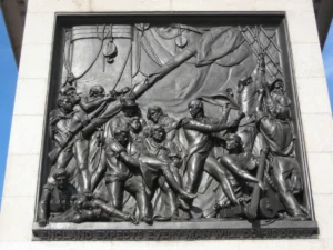 Muerte del almirante Nelson representada en la base de su columna en la plaza Trafalgar
